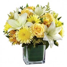 yellow flower arrangment sweet surprise vogue in a vase